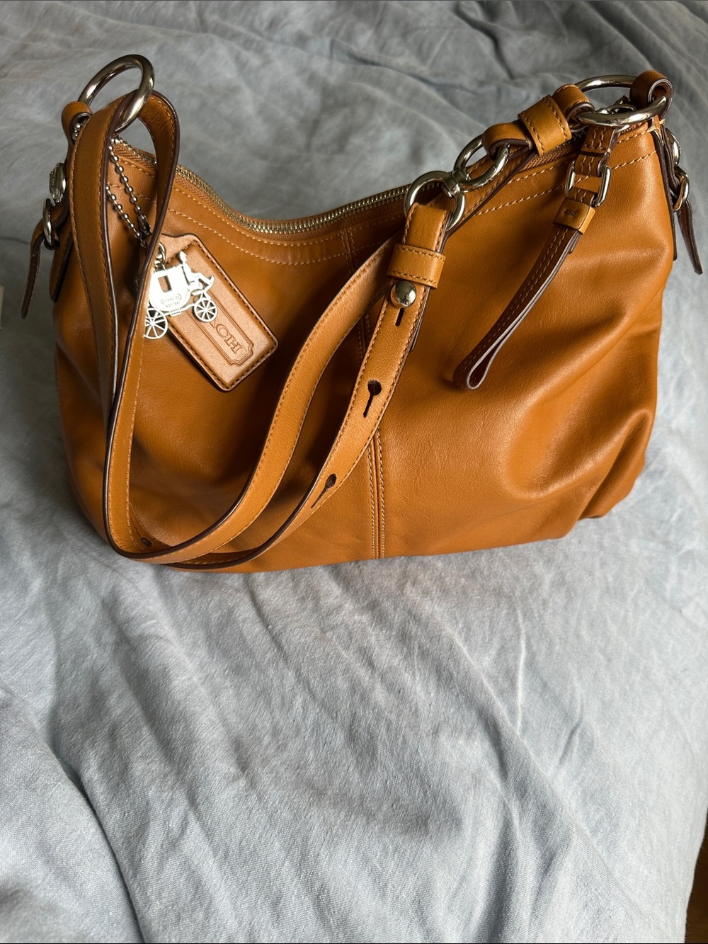 COACH Leather Shoulder Hobo in Saddle Tan. Super soft convertible strap